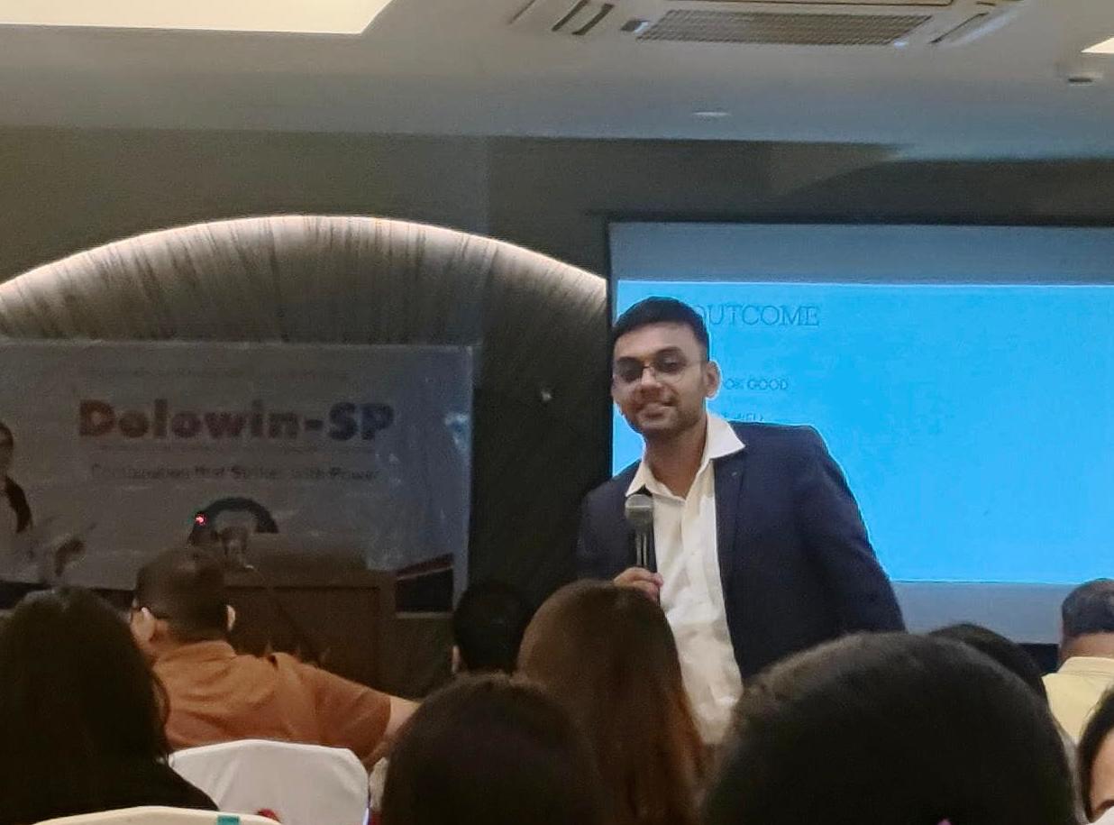 Dr. Kunal Banka speaking at a dental conference