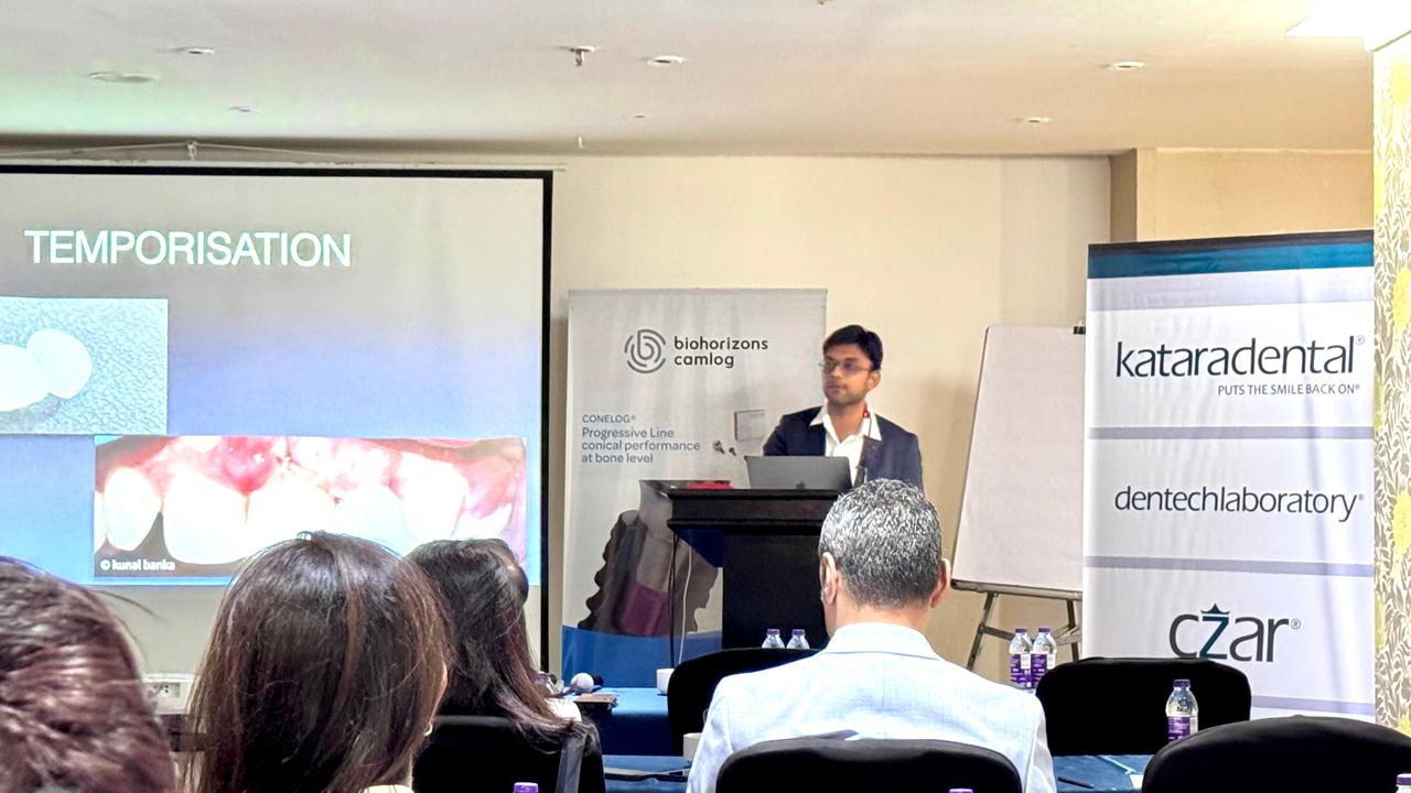 Dr. Kunal Banka speaking at a dental conference